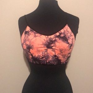 Orange and black tie dye sports bra